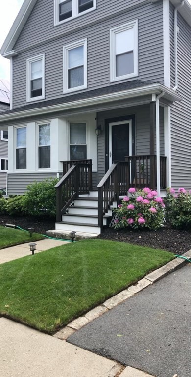 10 Columbus Avenue Saugus, MA 01906 - Photo 31 of 38 a front view of a house with a yard