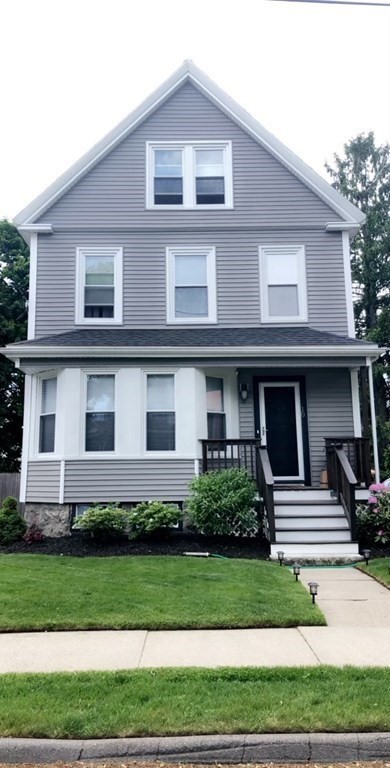 10 Columbus Avenue Saugus, MA 01906 - Photo 32 of 38 a front view of a house with a yard