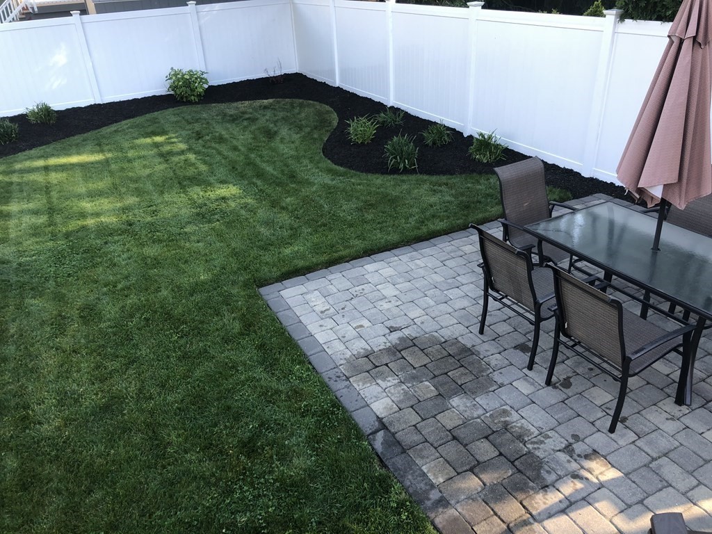 10 Columbus Avenue Saugus, MA 01906 - Photo 35 of 38 a view of a backyard with seating area