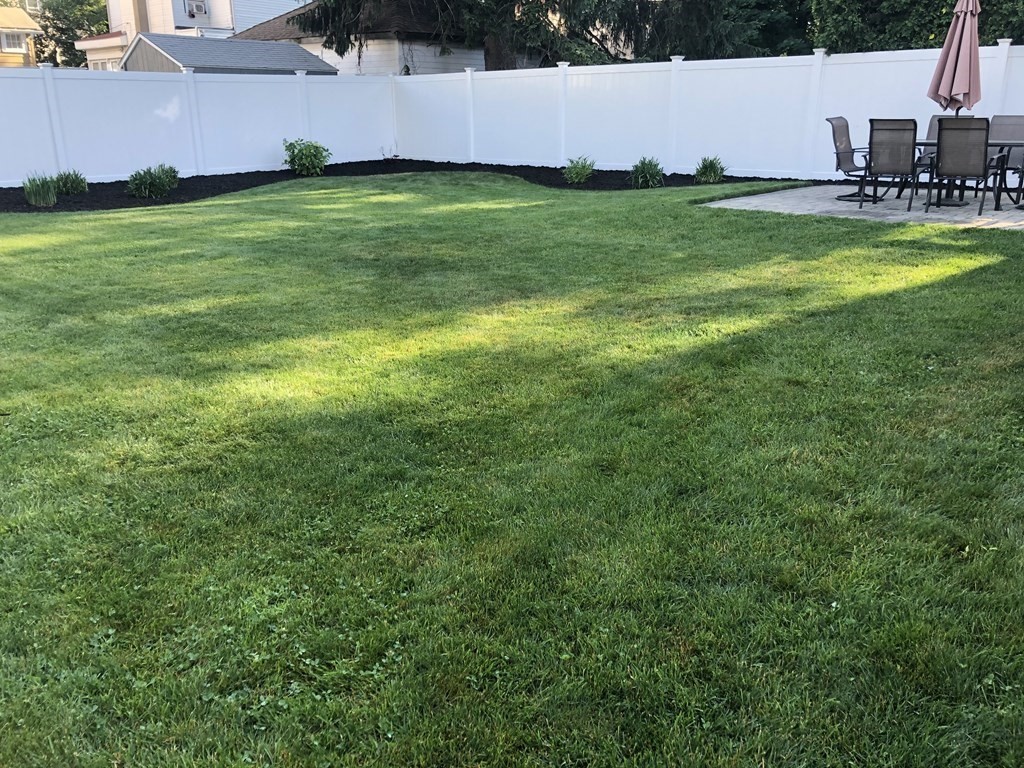 10 Columbus Avenue Saugus, MA 01906 - Photo 36 of 38 a view of backyard with swimming pool and outdoor seating