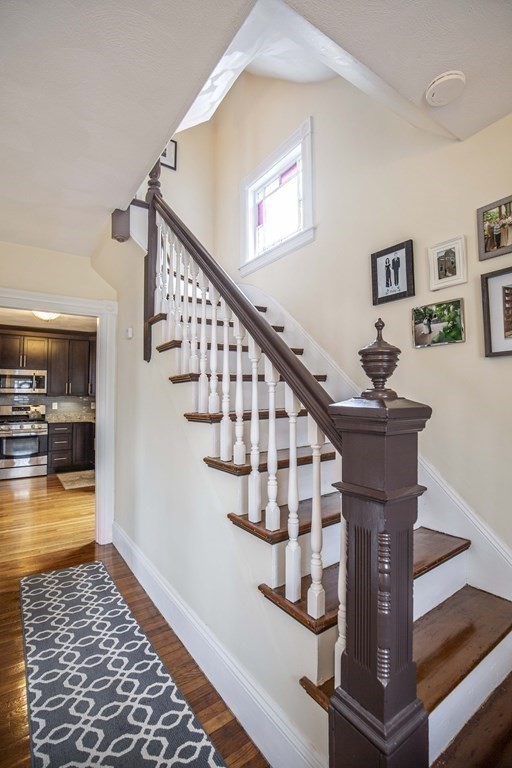10 Columbus Avenue Saugus, MA 01906 - Photo 4 of 38 a view of entryway and hall with wooden floor