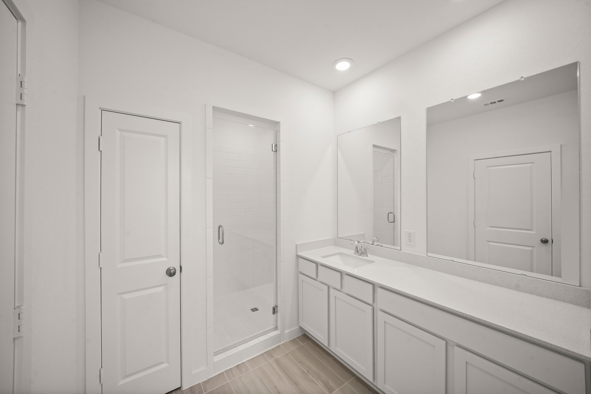 2207 Diagonal Lane Houston, TX 77051 - Photo 17 of 36 a bathroom with a granite countertop sink and a mirror