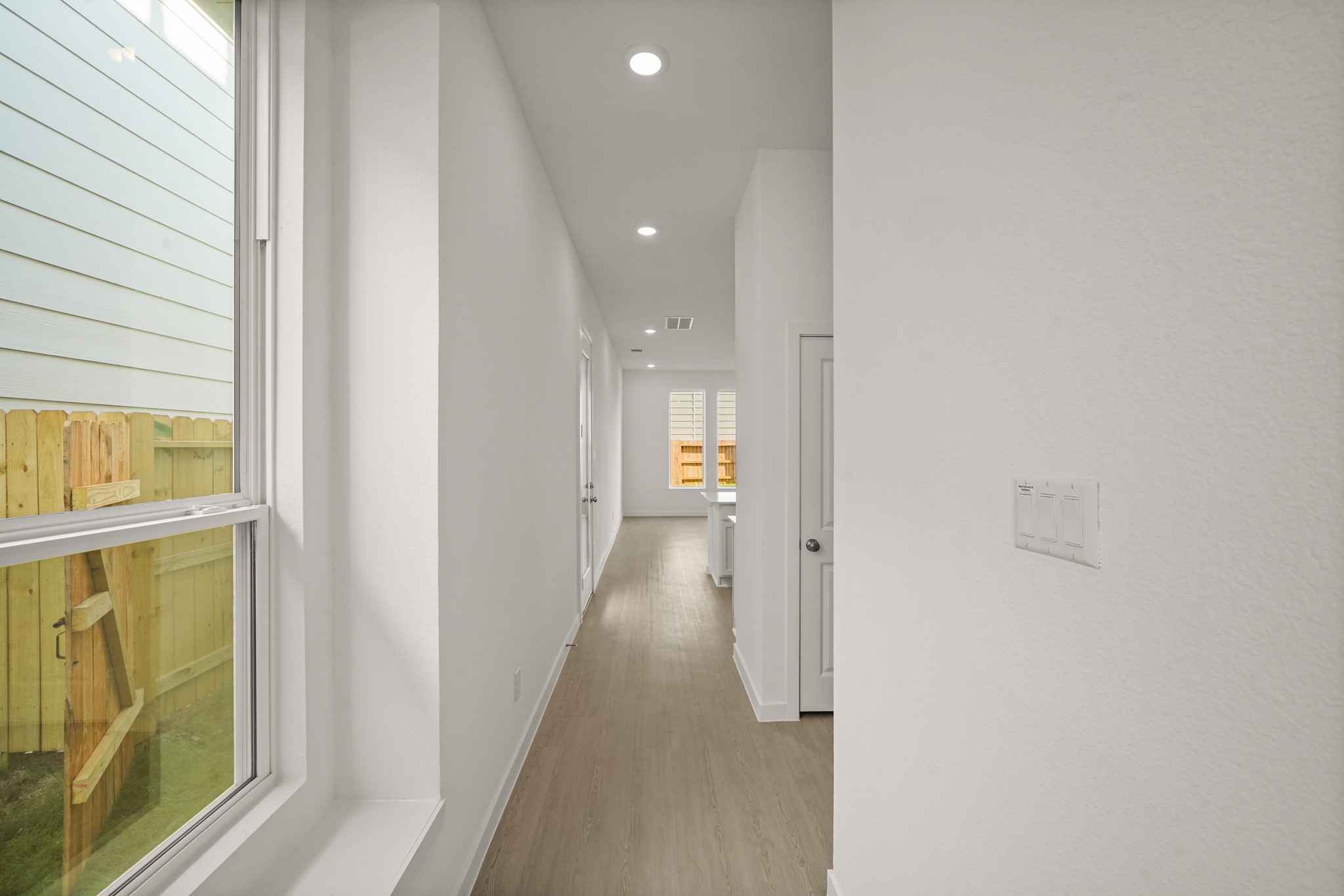 2207 Diagonal Lane Houston, TX 77051 - Photo 30 of 36 a view of a hallway with wooden floor