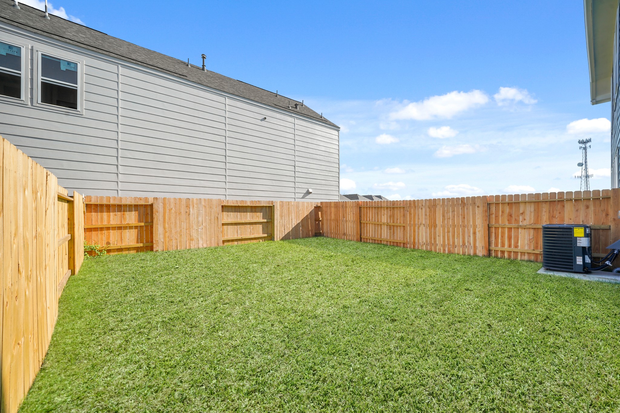 2207 Diagonal Lane Houston, TX 77051 - Photo 34 of 36 a view of a backyard with plants and wooden fence