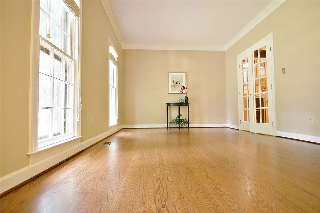 2001 Countrywood Road North Raleigh, NC 27615 - Photo 4 of 25 Living room is separated from family room by attractive French doors Living room