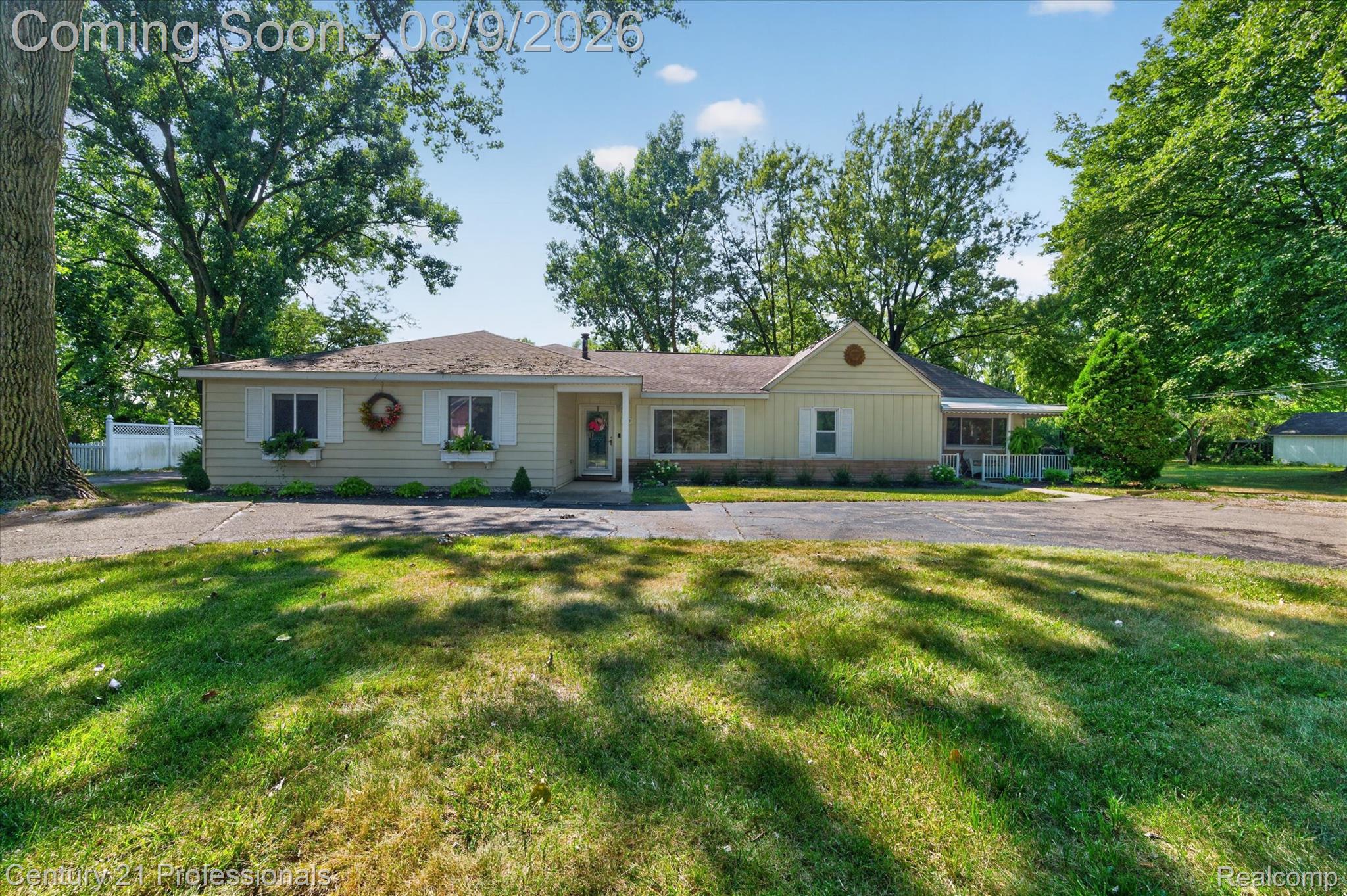 3425 McClure Road Troy, MI 48084 - Photo 2 of 34 Ranch-style residence featuring white window shutters and decorative window boxes