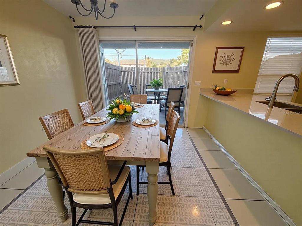 4033 Henley Road, Unit 1707 Orlando, FL 32839 - Photo 4 of 66 a view of a dining room with furniture window and outside view