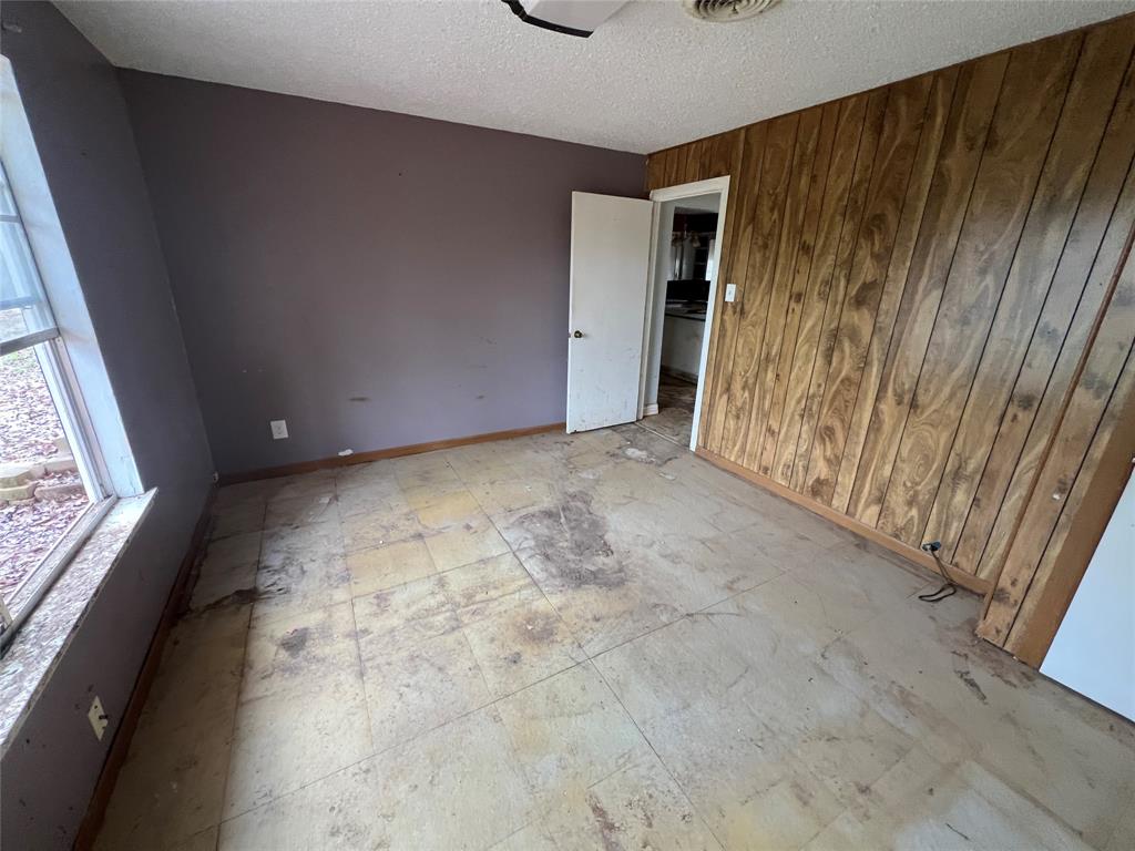 492 Richerson Road Denison, TX 75021 - Photo 11 of 28 a view of an empty room and window