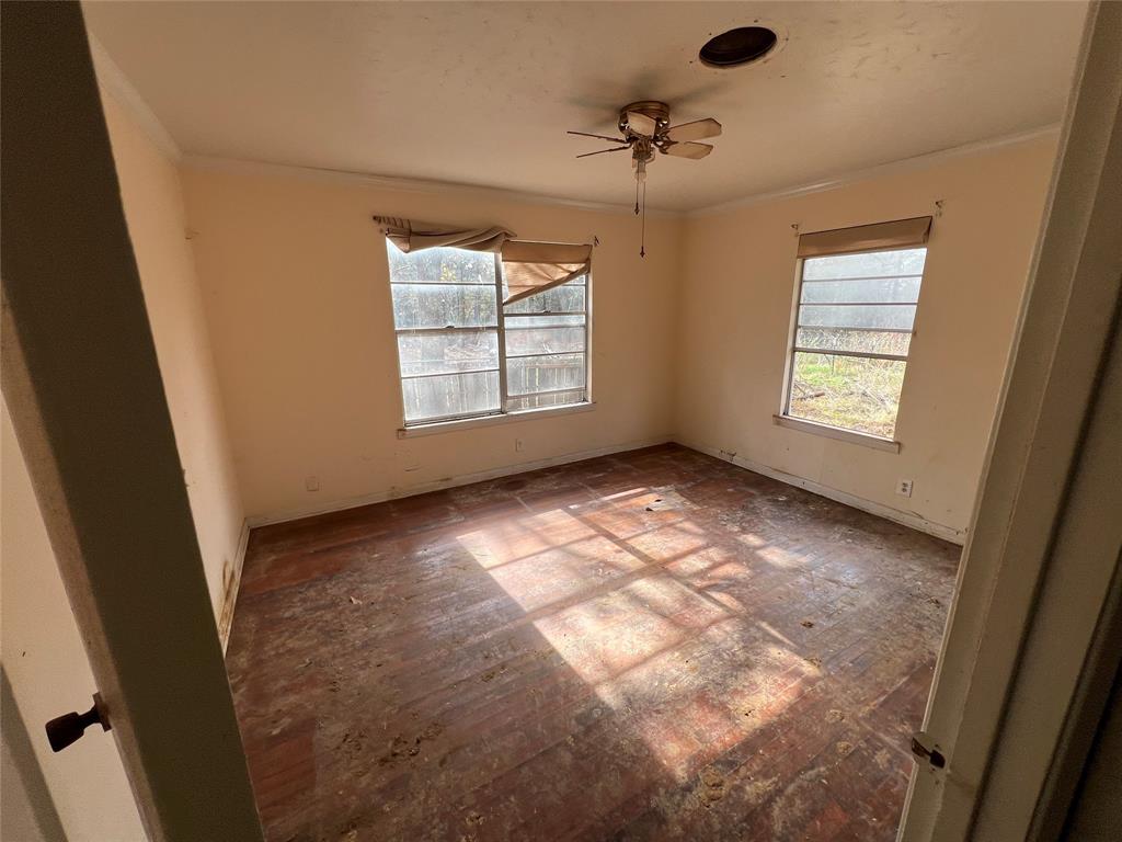 492 Richerson Road Denison, TX 75021 - Photo 7 of 28 a view of an empty room with a window