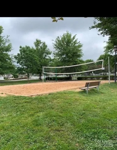 a view of a swimming pool with a porch