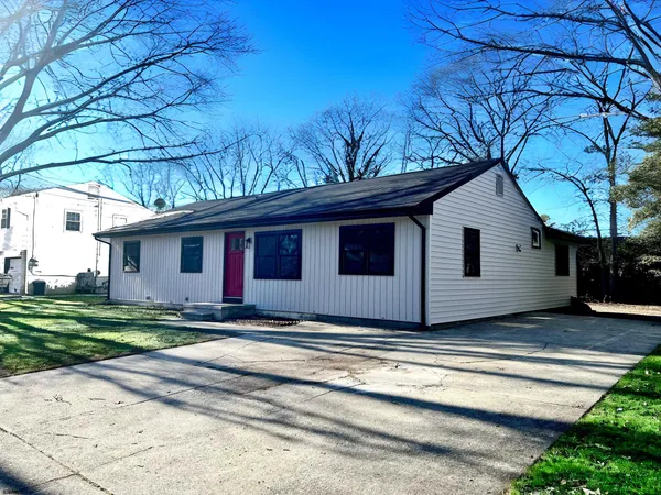 a kitchen with a stove and a sink