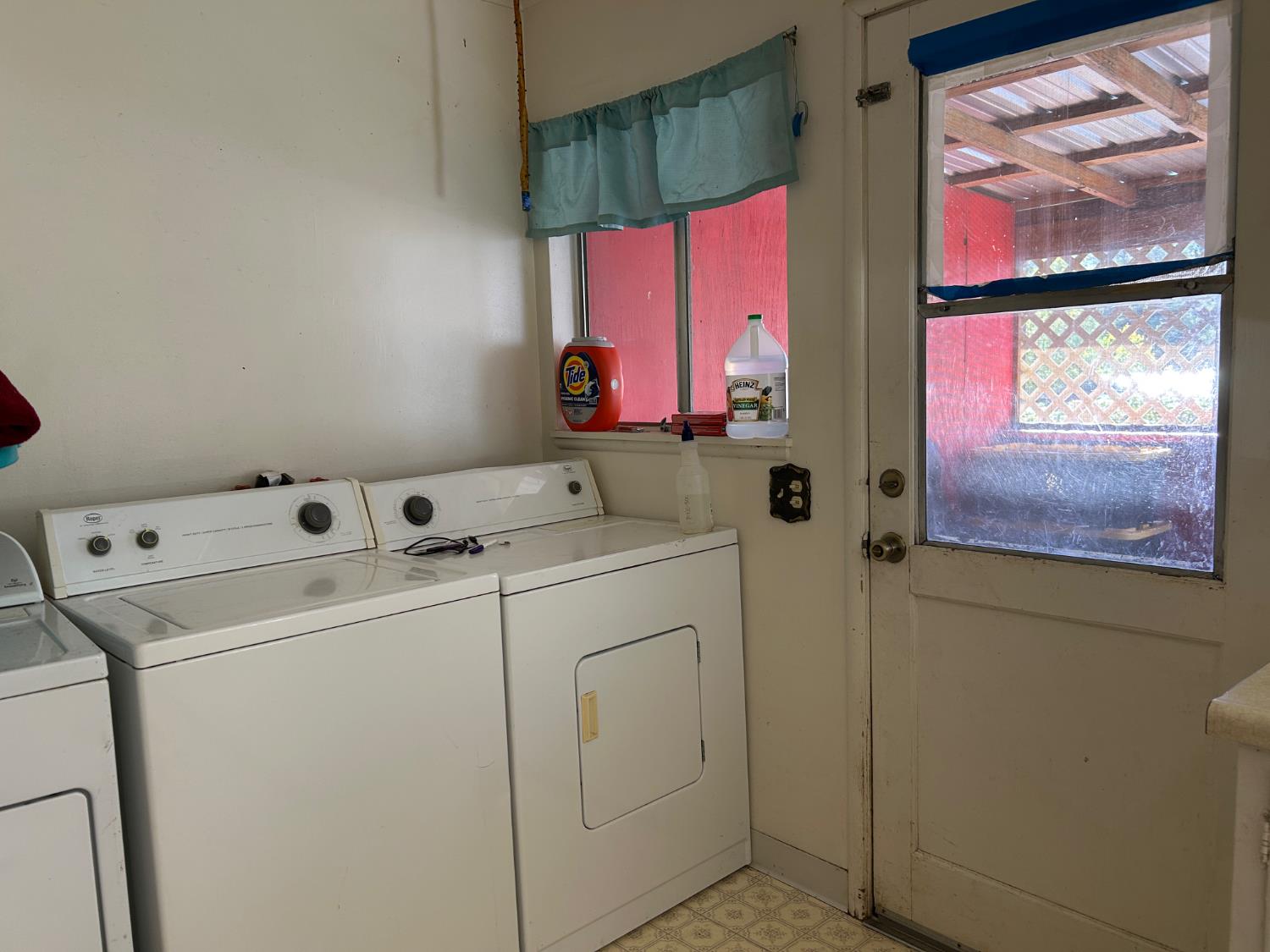 3423 Vallecito Bypass Road Vallecito, CA 95251 - Photo 17 of 37 a utility room with dryer and washer