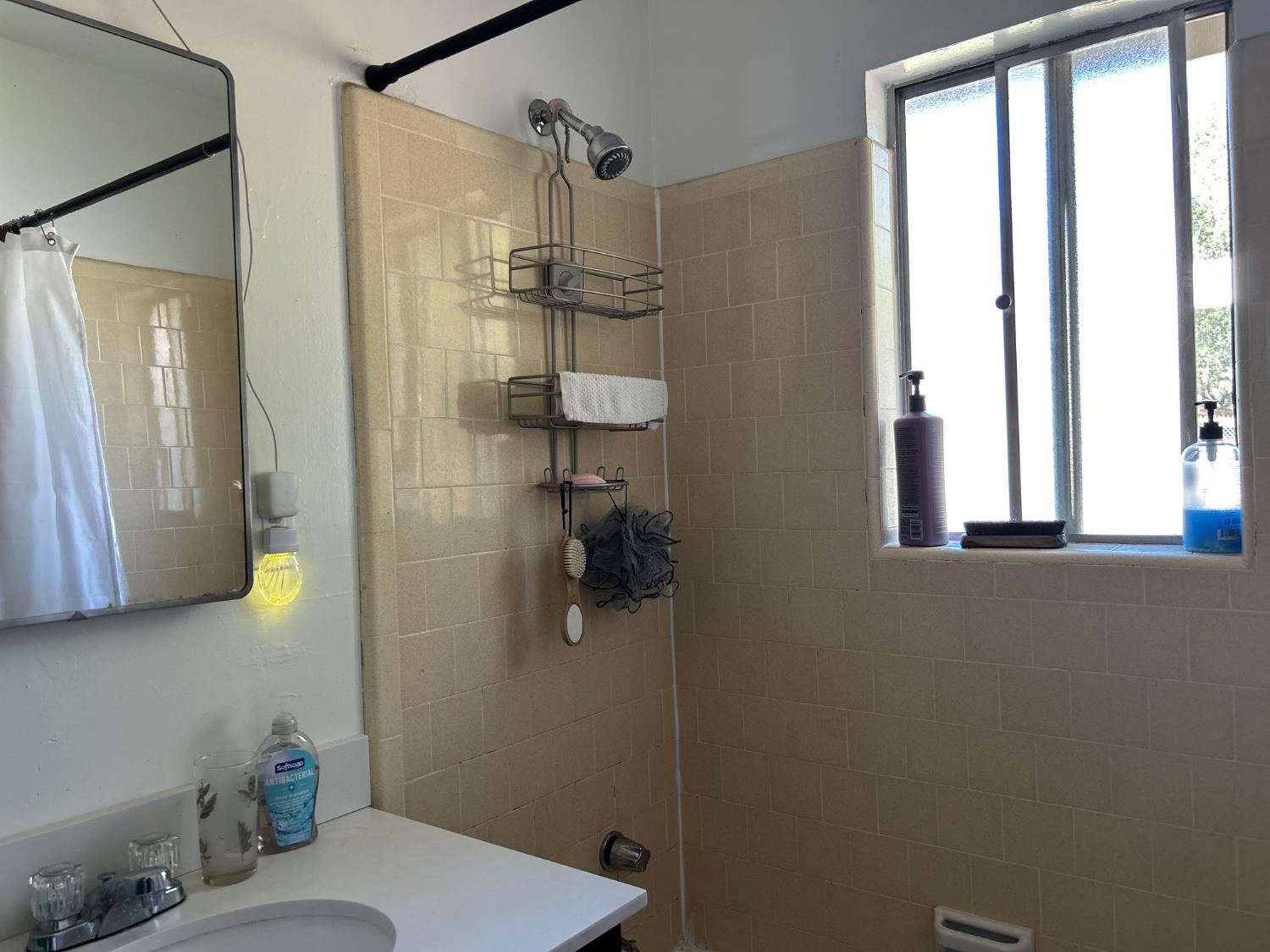 3423 Vallecito Bypass Road Vallecito, CA 95251 - Photo 18 of 37 a bathroom with a shower toilet and sink