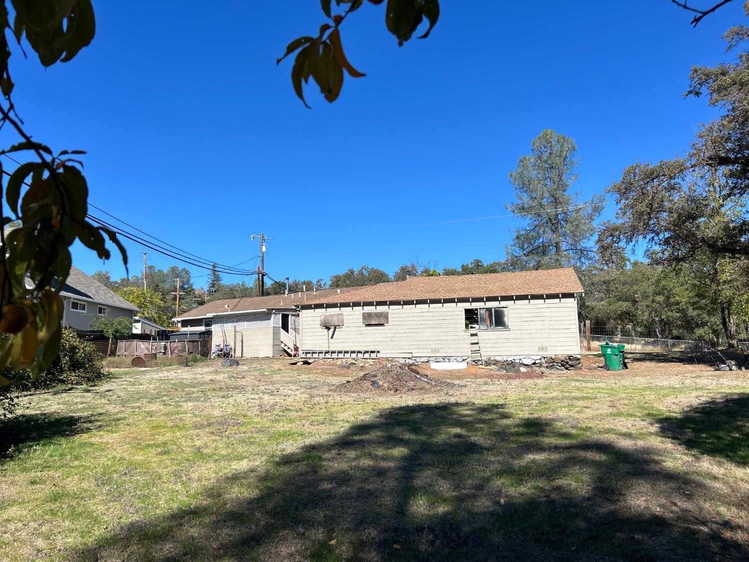 3423 Vallecito Bypass Road Vallecito, CA 95251 - Photo 20 of 37 a view of a house with a yard