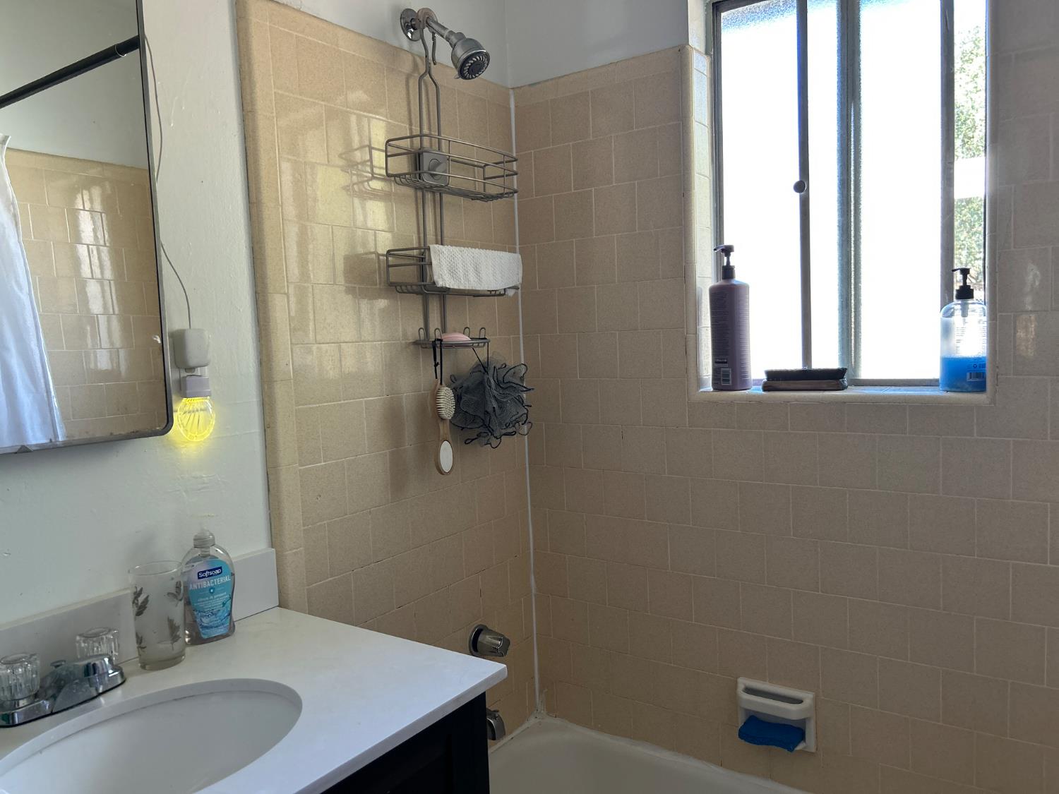 3423 Vallecito Bypass Road Vallecito, CA 95251 - Photo 10 of 37 a bathroom with a granite countertop sink and a mirror