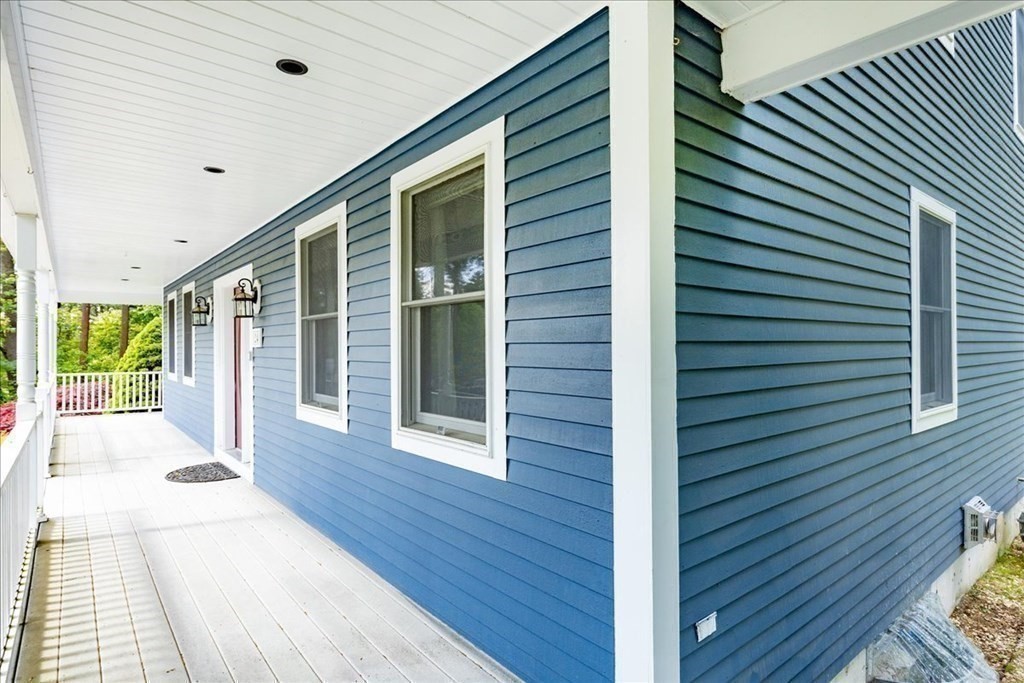 24 Campbell Road Middleton, MA 01949 - Photo 14 of 41 a view of a house with backyard and wooden deck