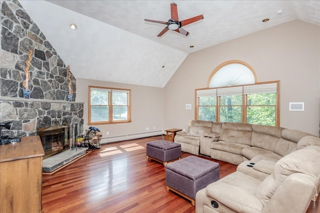 24 Campbell Road Middleton, MA 01949 - Photo 16 of 41 a living room with furniture fireplace and a large window