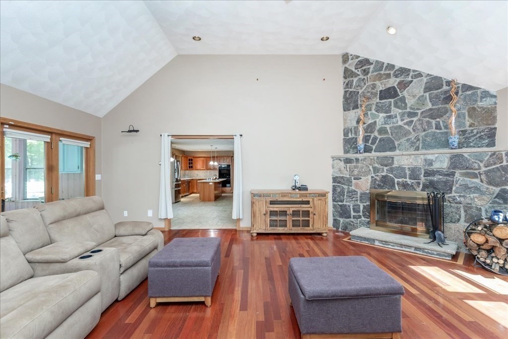 24 Campbell Road Middleton, MA 01949 - Photo 18 of 41 a living room with furniture and a fireplace
