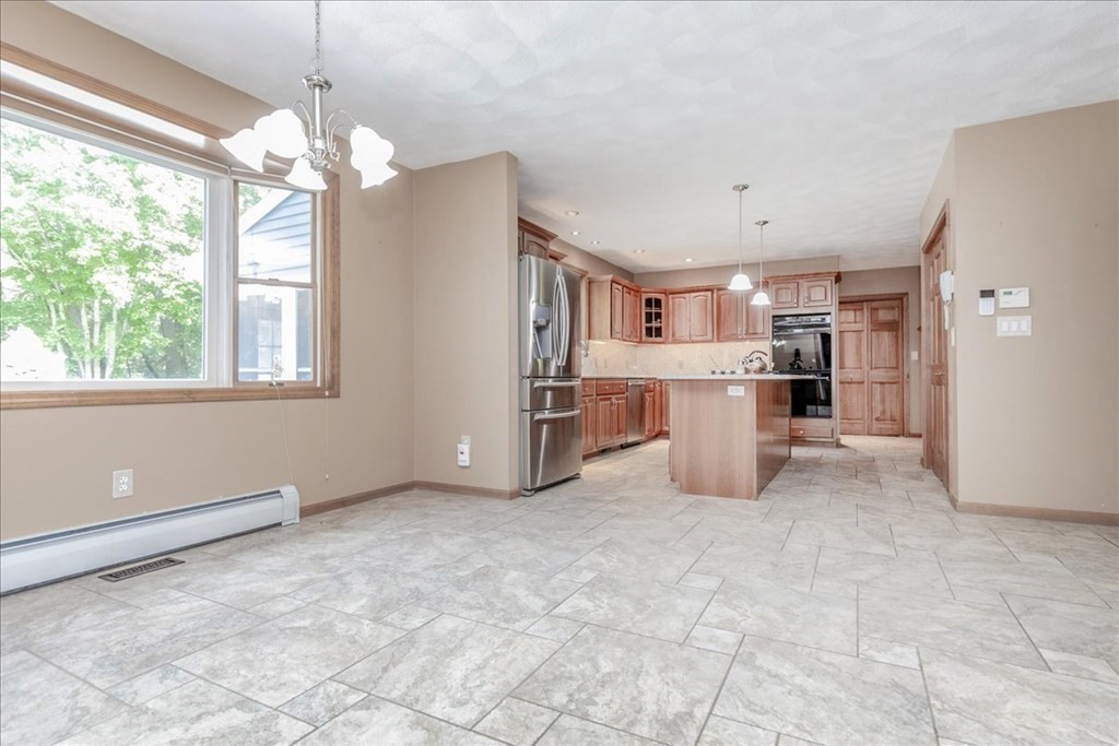 24 Campbell Road Middleton, MA 01949 - Photo 23 of 41 a view of a kitchen with a stove cabinets and a kitchen