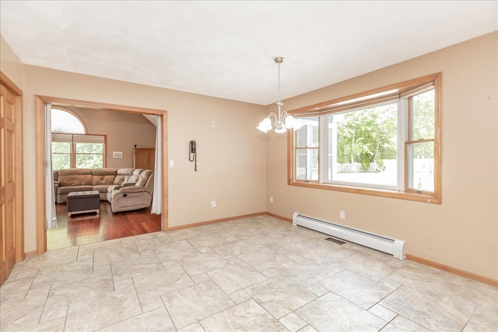 24 Campbell Road Middleton, MA 01949 - Photo 24 of 41 a view of livingroom with furniture and windows