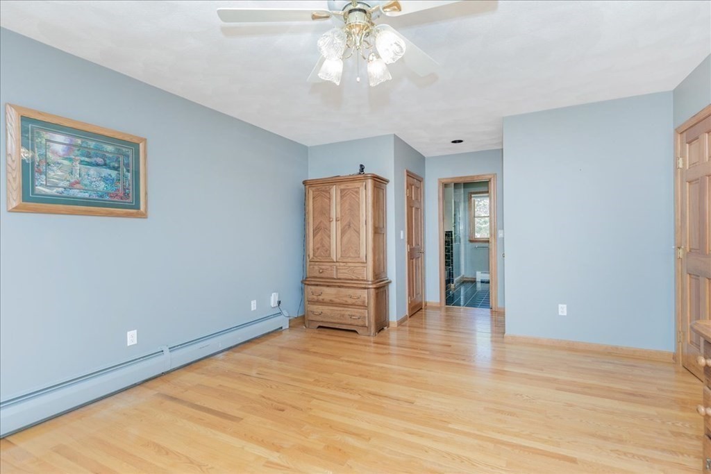 24 Campbell Road Middleton, MA 01949 - Photo 31 of 41 wooden floor in an empty room with a window