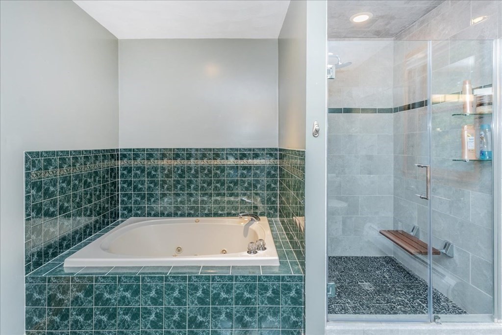24 Campbell Road Middleton, MA 01949 - Photo 33 of 41 a bathroom with a bathtub and shower