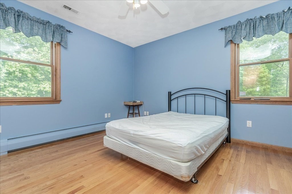 24 Campbell Road Middleton, MA 01949 - Photo 37 of 41 a bedroom with a bed and window