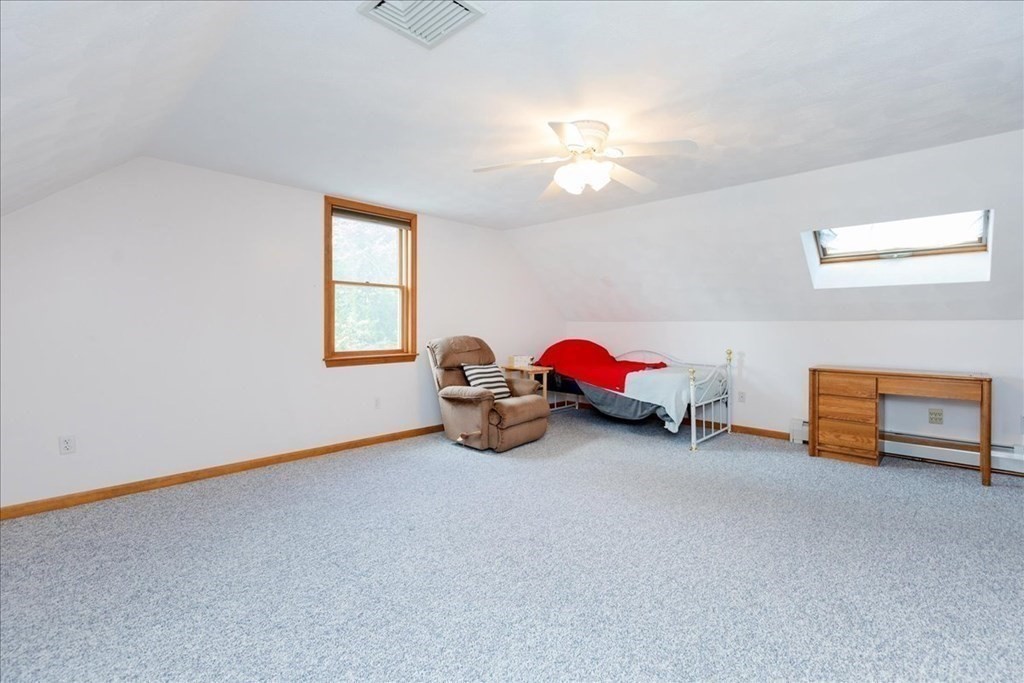 24 Campbell Road Middleton, MA 01949 - Photo 38 of 41 a view of a livingroom with furniture and a window