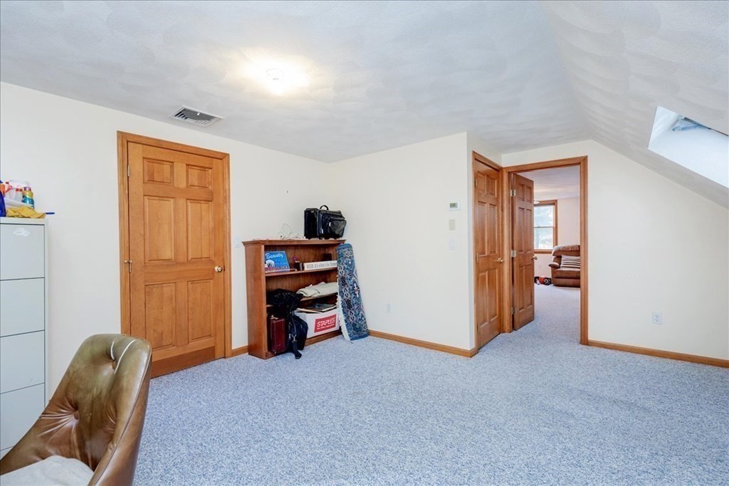 24 Campbell Road Middleton, MA 01949 - Photo 39 of 41 a view of a livingroom with furniture and closet