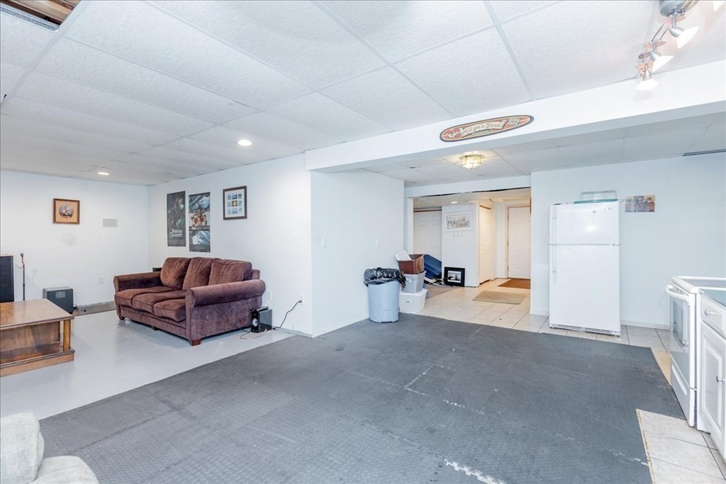 24 Campbell Road Middleton, MA 01949 - Photo 41 of 41 a living room with furniture and a couch