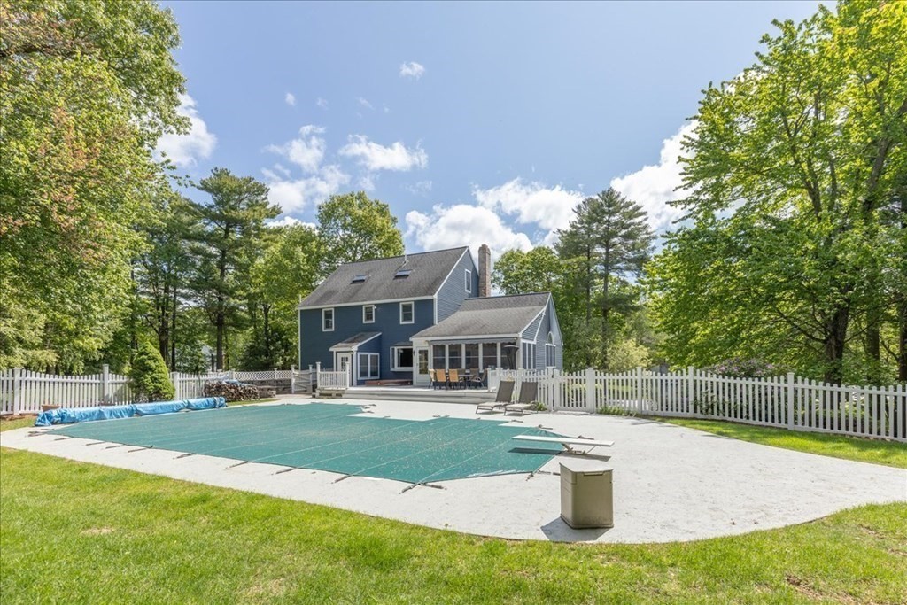 24 Campbell Road Middleton, MA 01949 - Photo 7 of 41 a view of a house with a swimming pool