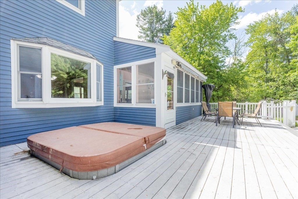 24 Campbell Road Middleton, MA 01949 - Photo 9 of 41 a view of a house with backyard and sitting area