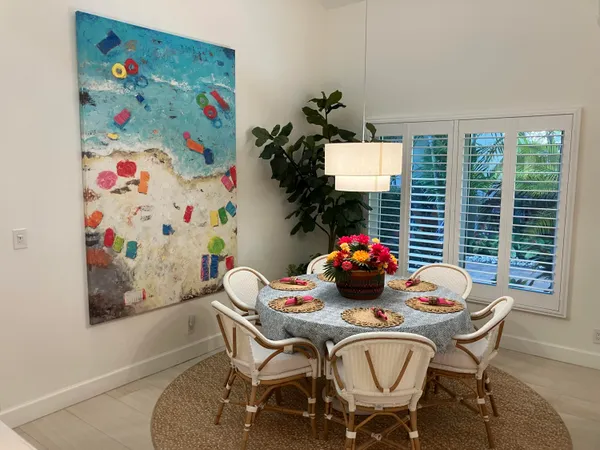 a dining room with furniture and a toys