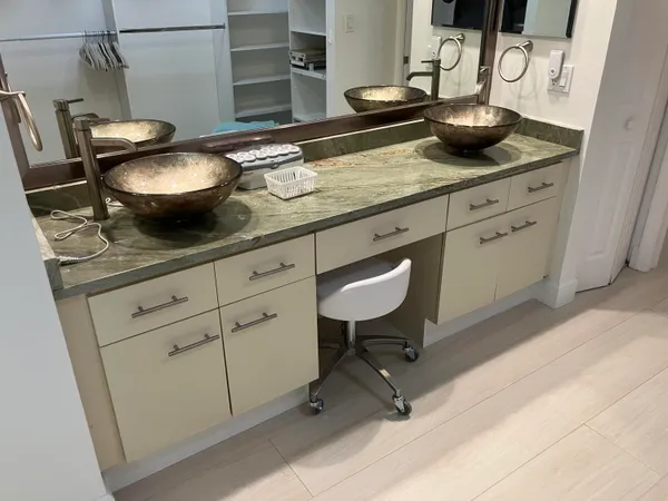 a kitchen with a sink and a stove