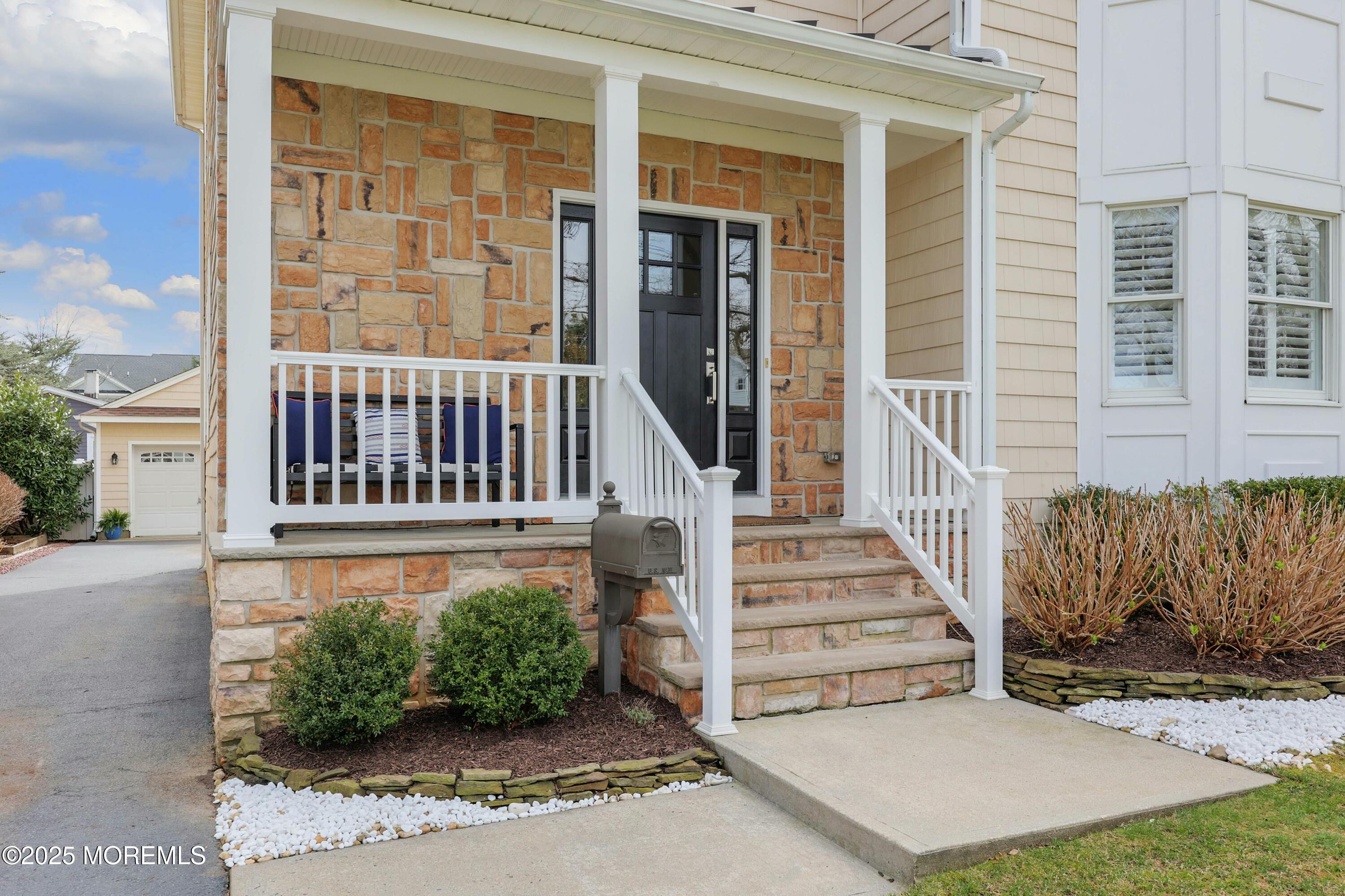 105 Black Point Road Rumson, NJ 07760 - Photo 2 of 33 front view of a house with a porch