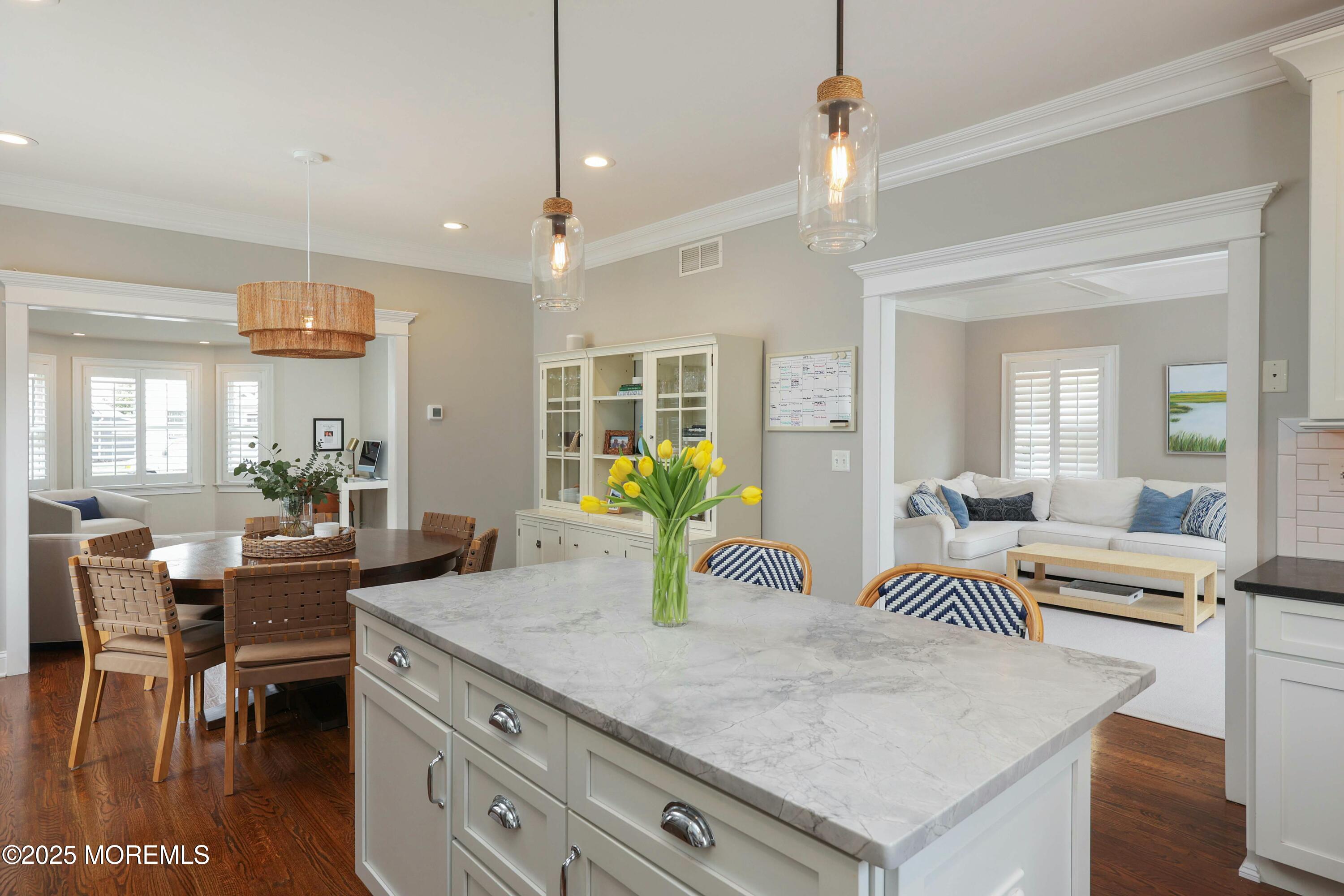 105 Black Point Road Rumson, NJ 07760 - Photo 10 of 33 a kitchen with a table and chairs in it