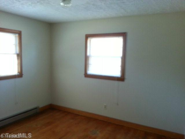 613 Guerrant Springs Road Ruffin, NC 27326 - Photo 8 of 12 1st Bedroom.
