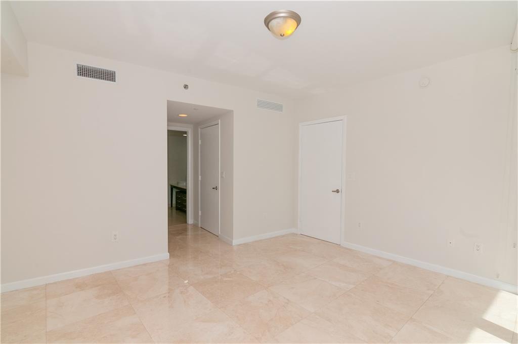 465 Brickell Avenue, Unit BAY 419 Miami, FL 33131 - Photo 24 of 54 a view of an empty room