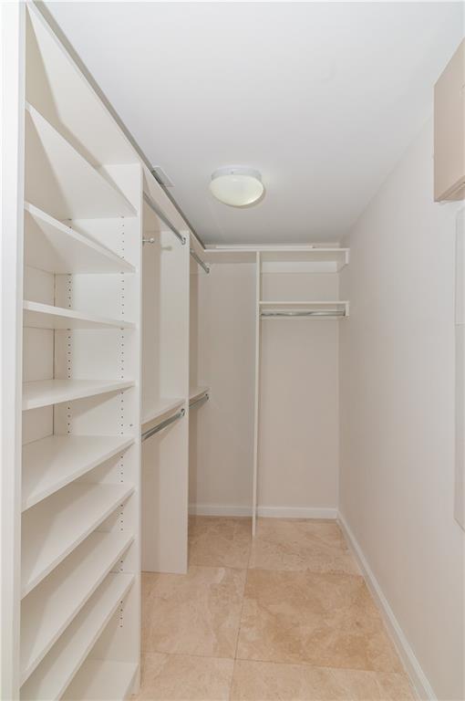 465 Brickell Avenue, Unit BAY 419 Miami, FL 33131 - Photo 26 of 54 a view of an empty walk in closet