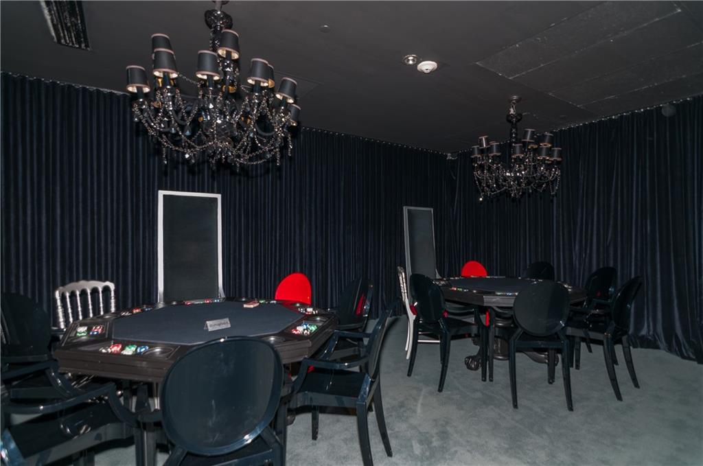 465 Brickell Avenue, Unit BAY 419 Miami, FL 33131 - Photo 44 of 54 a view of a dining room with furniture and chandelier