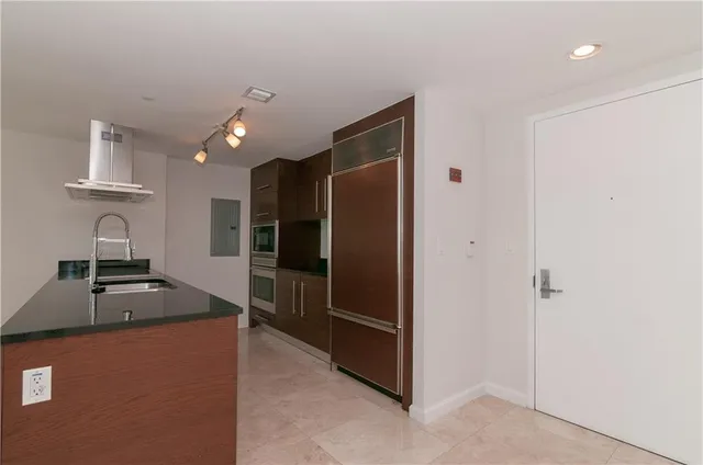 a bathroom with a shower and a toilet