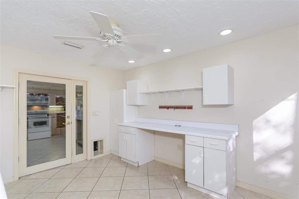 2101 Sunset Point Road, Unit 1003 Clearwater, FL 33765 - Photo 35 of 39 Enclosed Porch /Craft Room