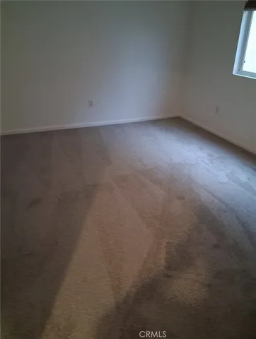 a view of a room with rack on the wall