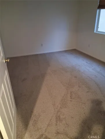 a view of a room with an empty space