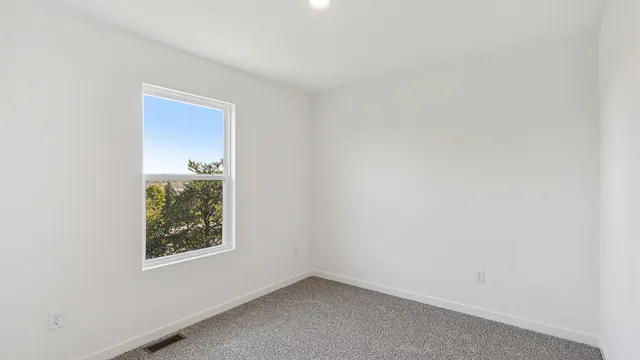 an empty room with a window