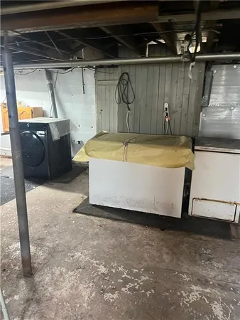 a kitchen with a sink and a microwave