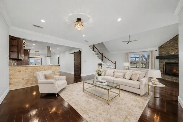 a living room with furniture and a couch