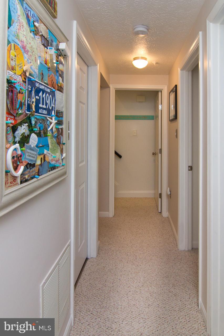 4122 Maple Path Circle, Unit 55 Baltimore, MD 21236 - Photo 15 of 27 a view of an entryway with many shelves