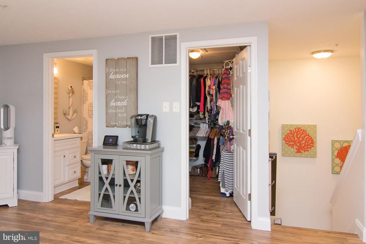 4122 Maple Path Circle, Unit 55 Baltimore, MD 21236 - Photo 26 of 27 a view of a hallway with wooden floor and entryway