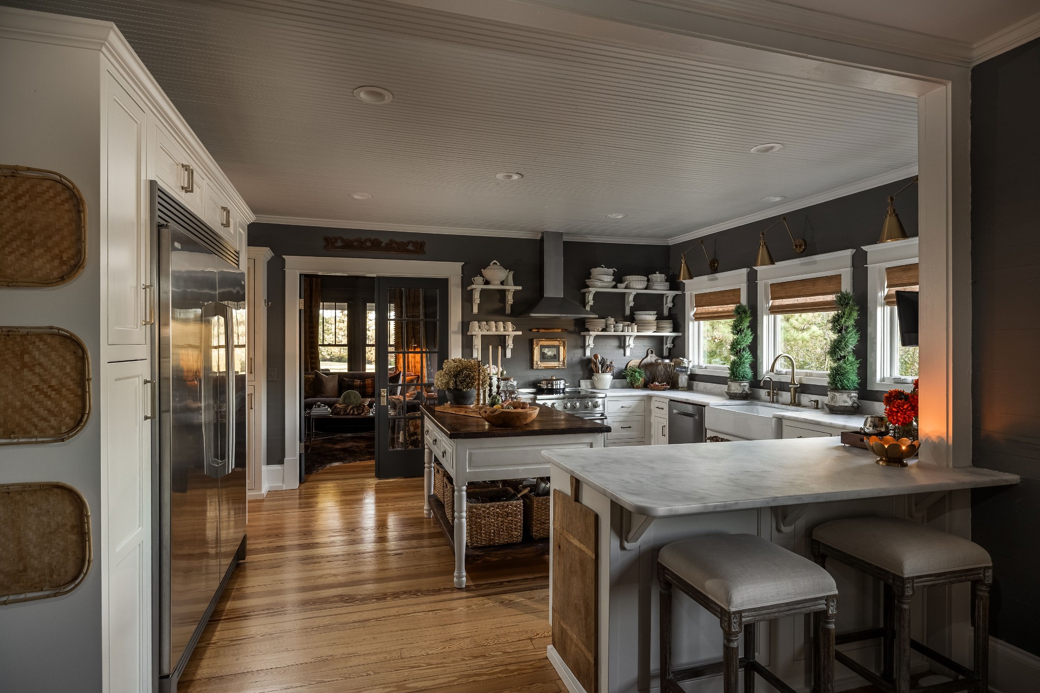 6537 Arno-College Grove Road College Grove, TN 37046 - Photo 14 of 75 a dining hall with stainless steel appliances a dining table and chairs with wooden floor